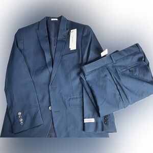 Calvin Klein 2 piece boys stretch husky suit, Polyester /spandex.